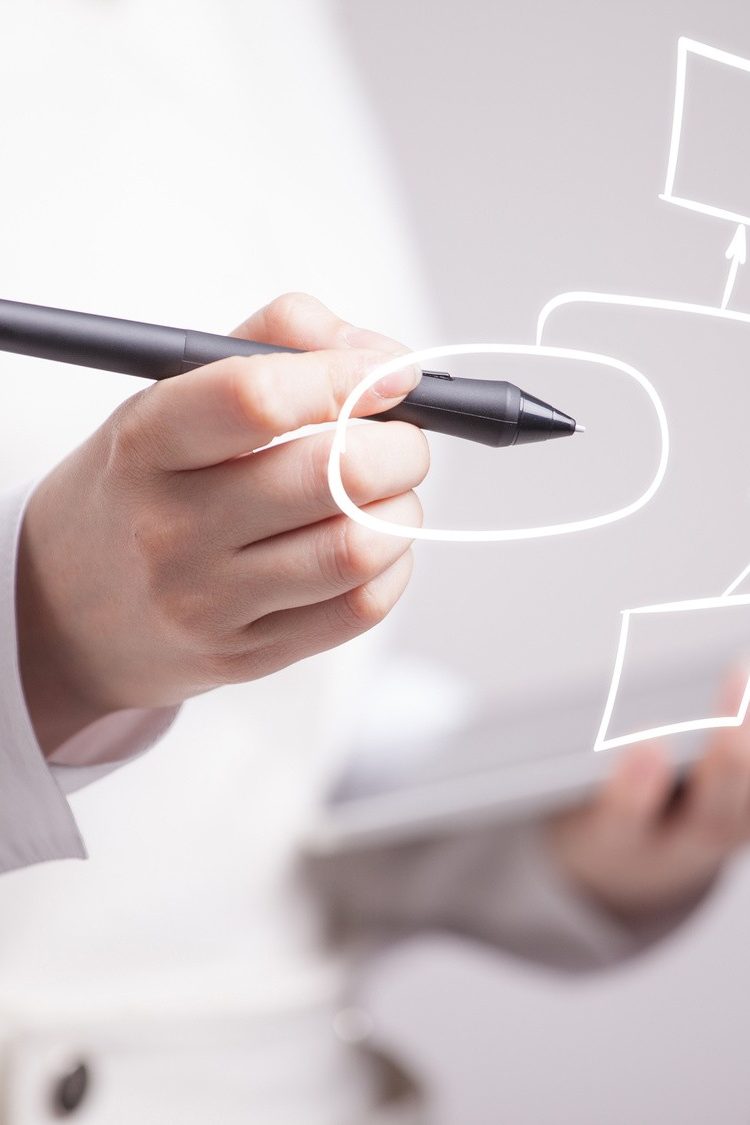 Businesswoman drawing flowchart, business process concept on grey background.